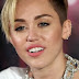 Miley Cyrus sensual bajo las sábanas 