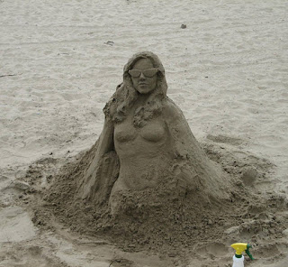 Wallpaper of Sexy Girl in See-Beach Hot Sand Sculptures picture