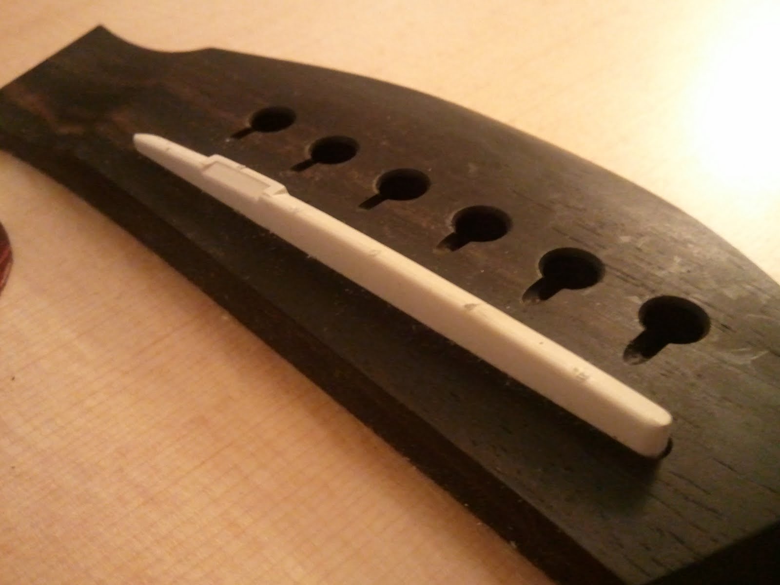 It's Always Cloudy in Seattle Sanding the Bridge Saddle of Acoustic Guitar