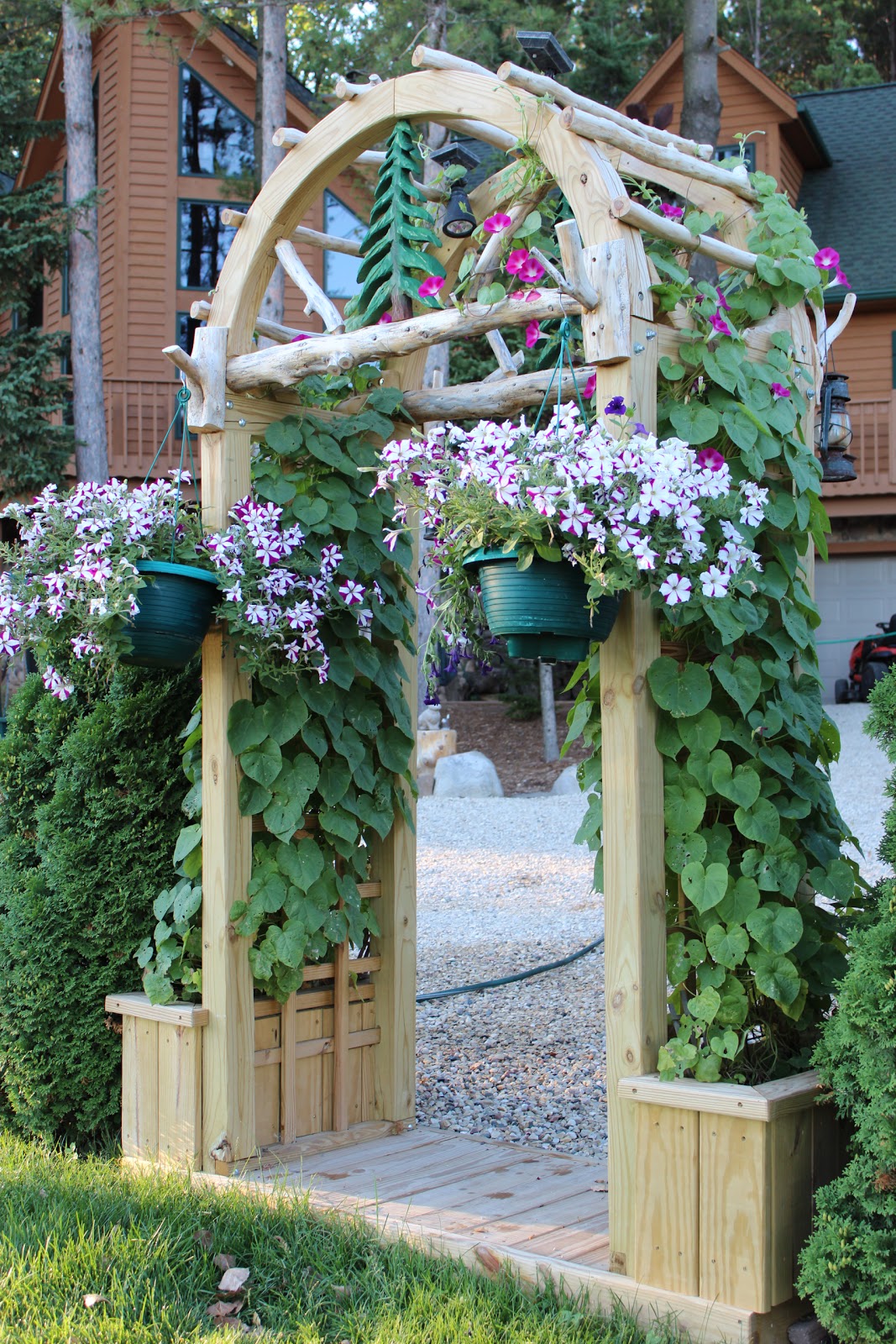 The Log Blog Archway with Flower Boxes