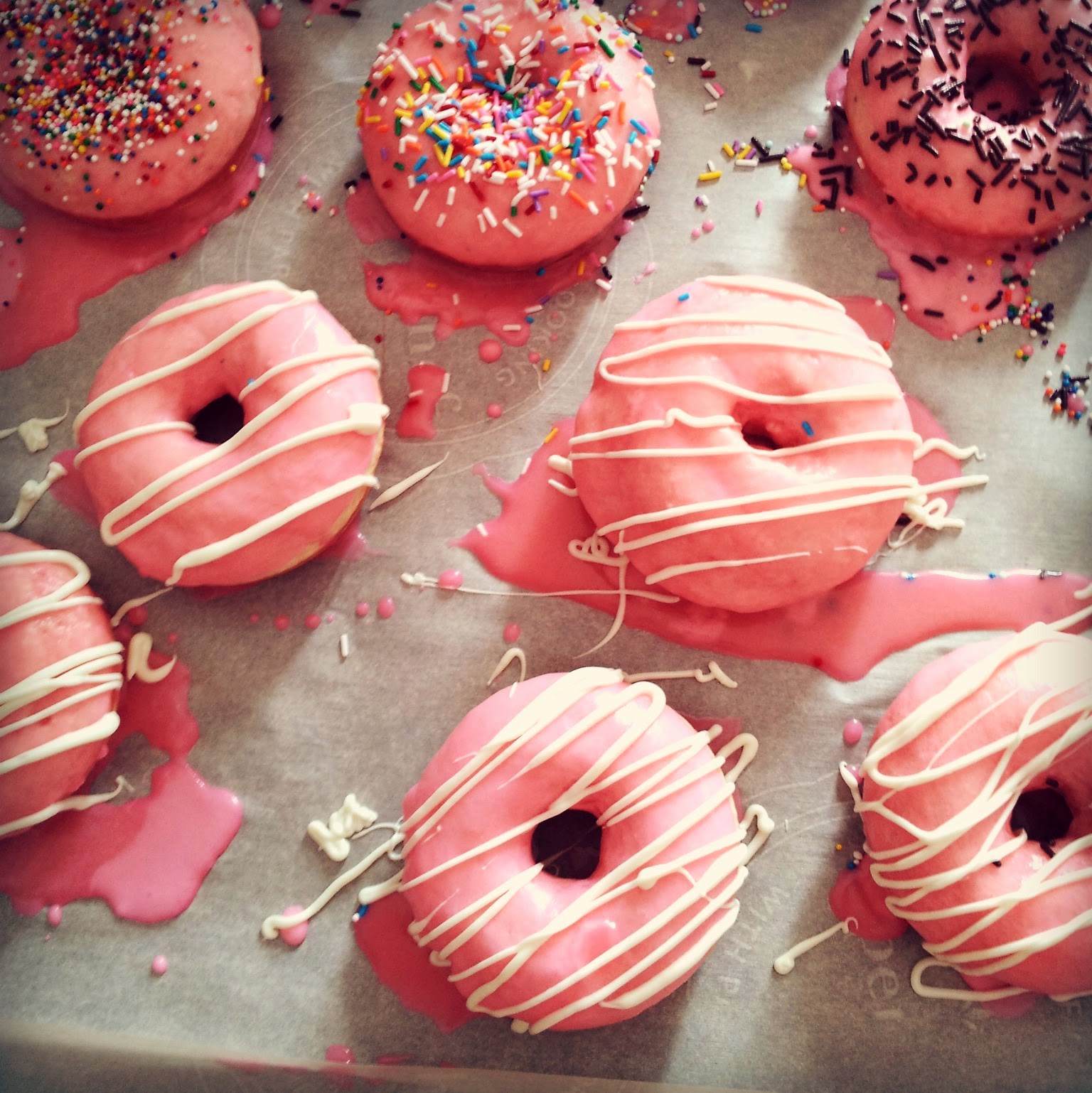 Feeding My Addiction Perfectly Pink Baked Donuts with Vanilla Glaze