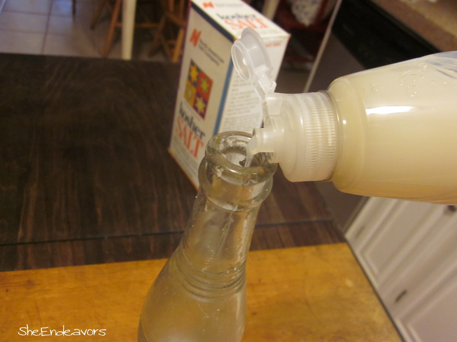 She Endeavors Cleaning Old Bottles