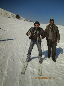 Ghulam.Hassan, a local tourist ski instructor teaching me basic skiing.