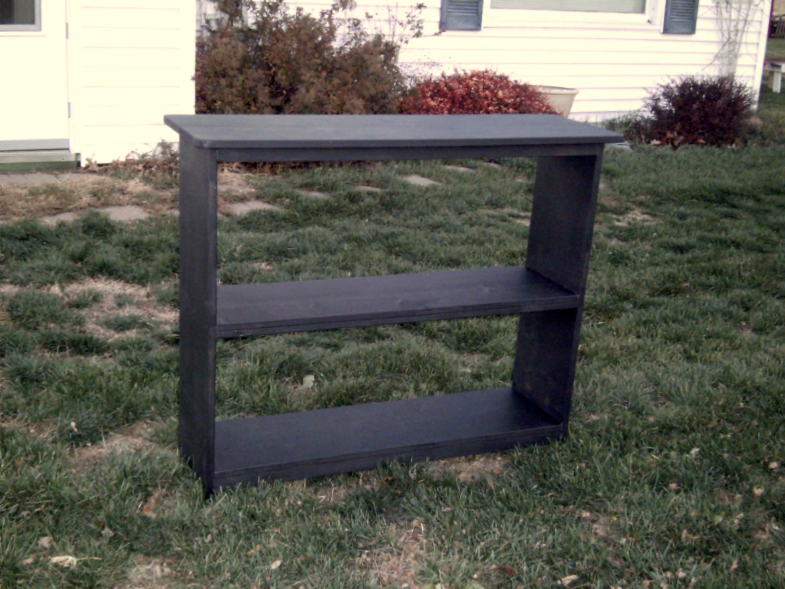 Full Circle Creations A black stand...