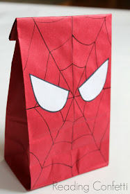 Spider web cupcakes, favor bags, and more ideas for a DIY Spiderman birthday party including a free printable