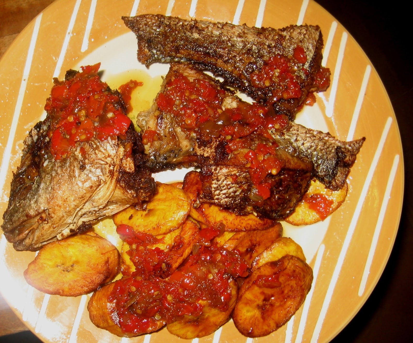 Fried Plantain And Fish Eaten With Pepper Sauce