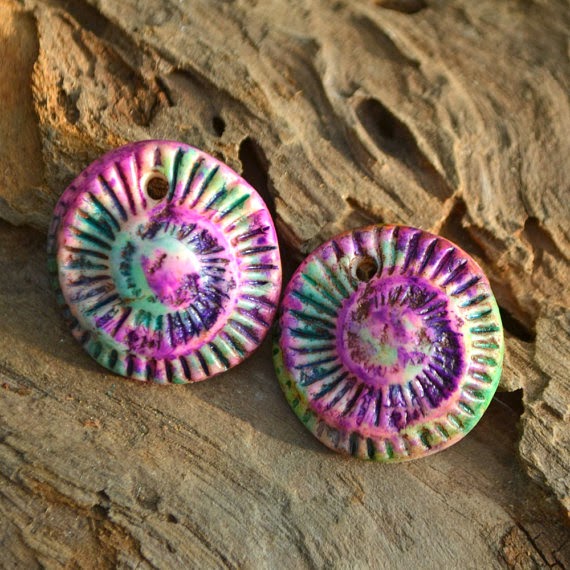 https://www.etsy.com/listing/191732839/handmade-polymer-clay-ammonite-beads-1?ref=shop_home_active_1&ga_search_query=purple