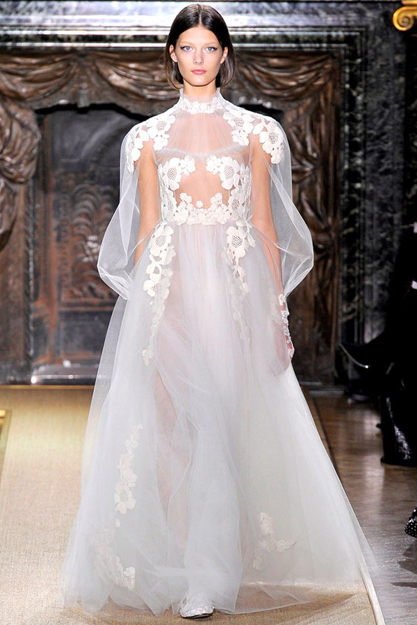 lace and tulle white gown on runway