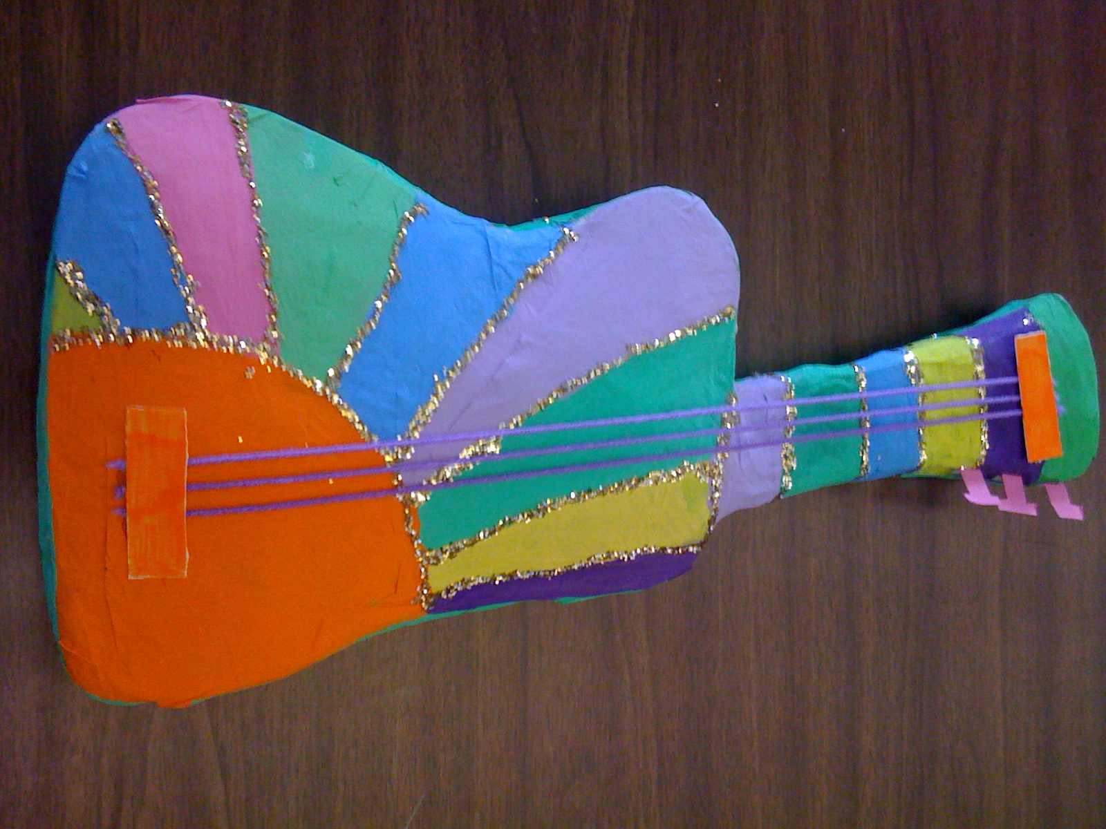 Miss Rossi's Art Class Peter Max Inspired Guitars!