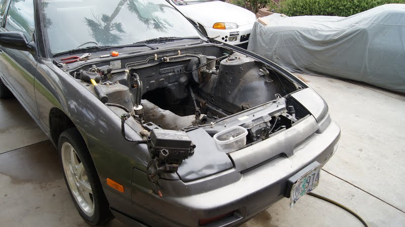 Above, got it pulled out and started to clean the engine bay.