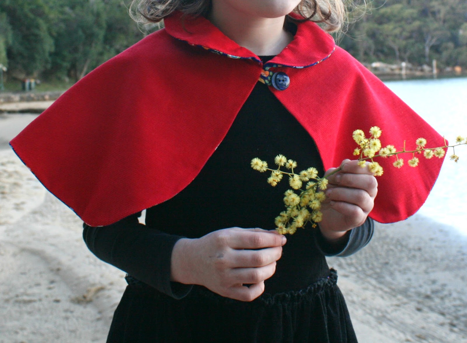 Amelie and Atticus Peter Pan Cape with Button Closure