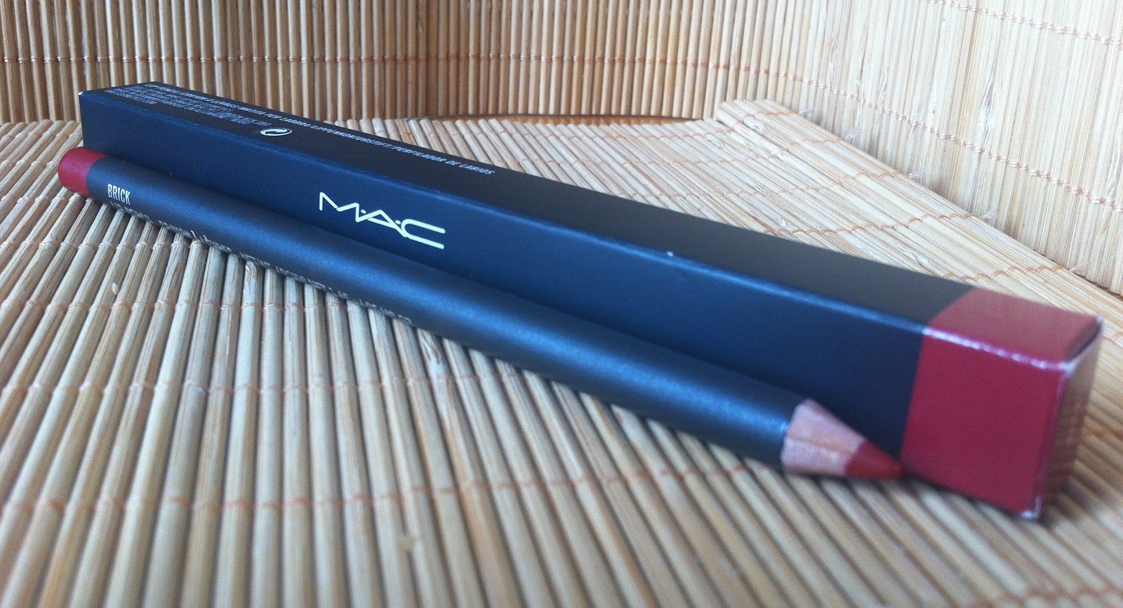 This is overstood MAC Viva Glam I with MAC Brick Lip Pencil