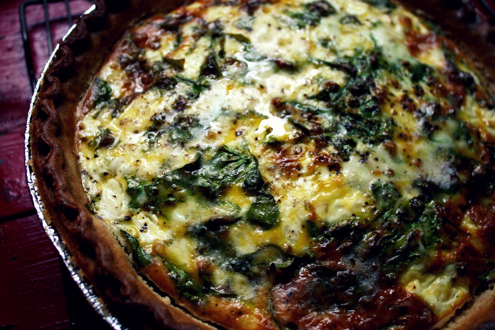we eat. happy. portobello mushroom & spinach quiche.