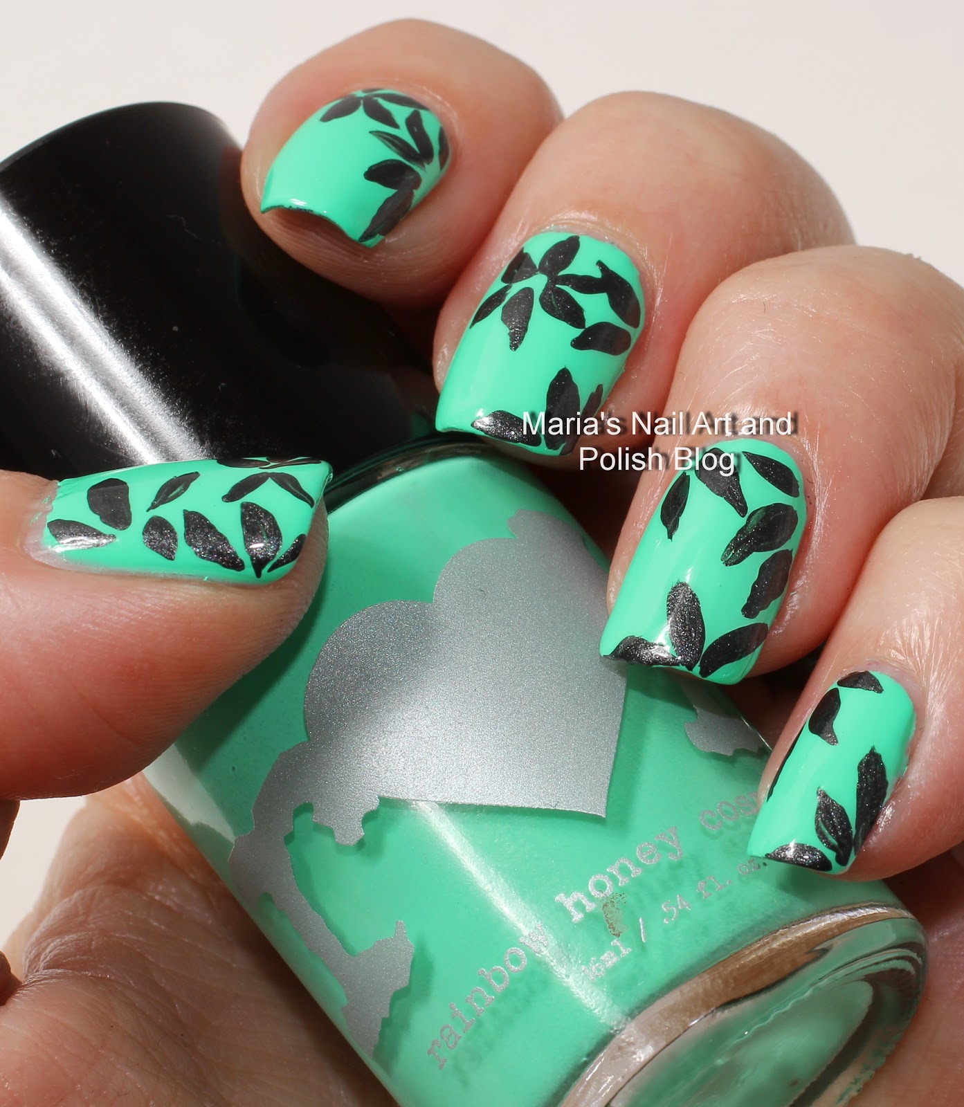 Marias Nail Art and Polish Blog Floral petal nail art in black and green