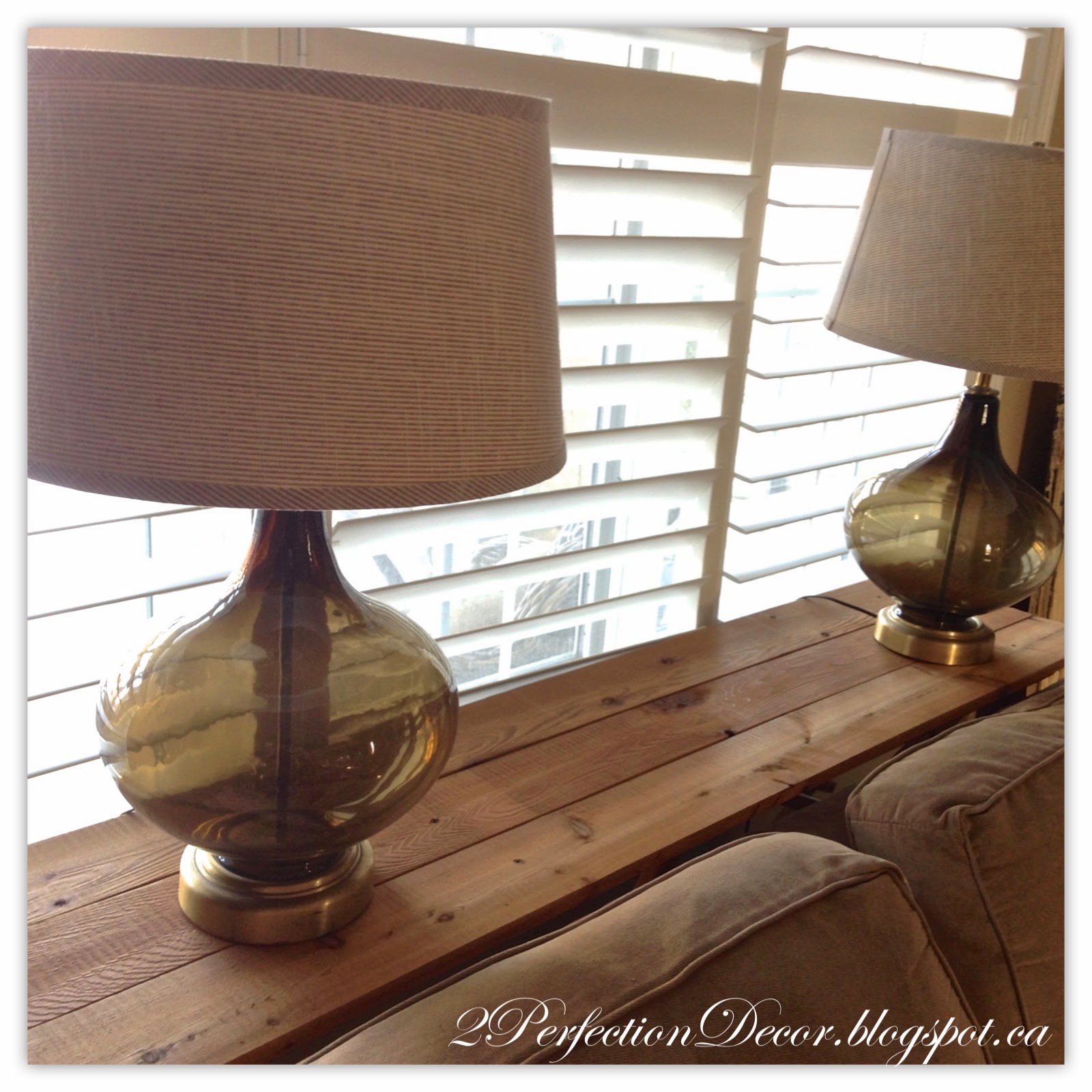 2Perfection Decor Vintage Ironing board makeover into a Planked Sofa Table.