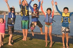 Kids jumping at camp