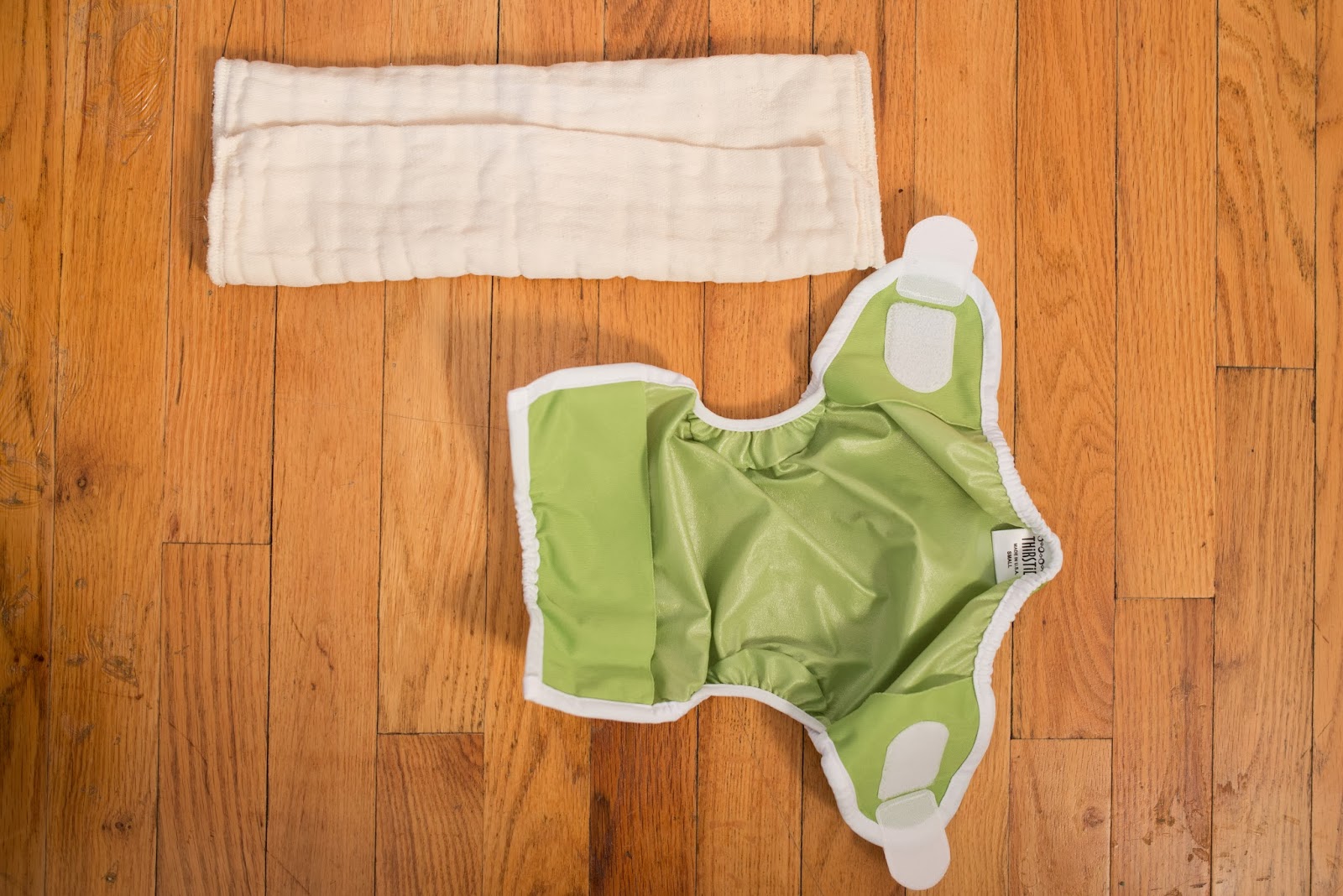 fold a cloth diaper Green Diaper Babies