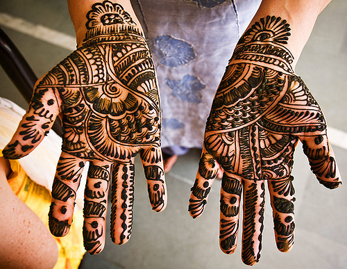  of their husband while choosing the simple mehndi designs for hands
