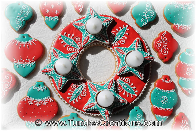 Teal and red gingerbread Christmas decoration by Tunde Dugantsi