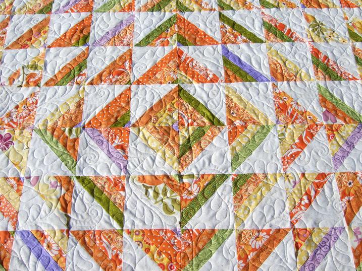 Tamarack Shack Orange HST Strip Quilt