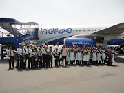 R.N.OXFORD STUDENTS ARE INFRONT OF INDIGO AIRLINES BEFORE TAKE OFF IN DELHI . (dsc )