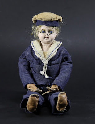 creepy sailor doll
