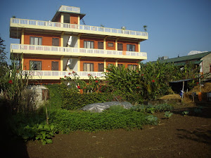"New Annapurna Guest House" as seen from the guesthouse farm.