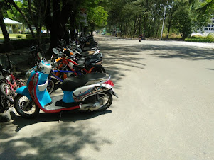 A view of the motorcycles and broad streets of Hulhumale' city.
