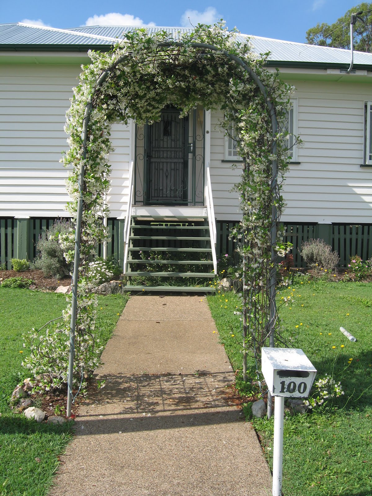 Gates & Entrances Steel arches with jasmine