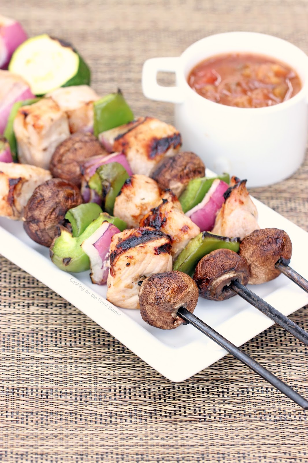 Grilled Pork Kabobs with ChileLime Sauce Cooking on the Front Burner
