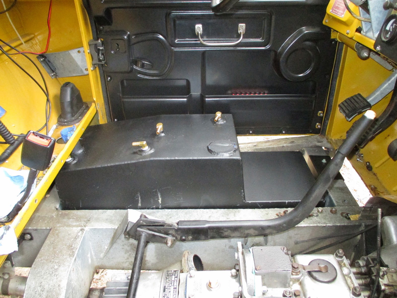 Genocache Land Rover extended range fuel tank install