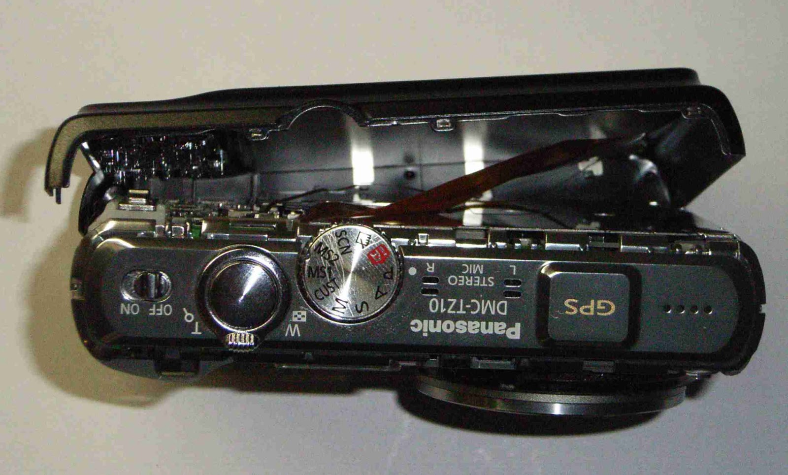 Musing's of a Gardener Fixing a jammed focus lens in a Panasonic Lumix