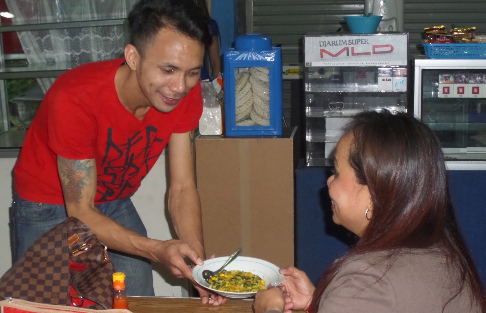 norman berjualan bubur