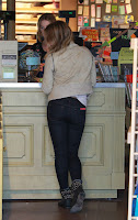 Hilary Duff at a cash register