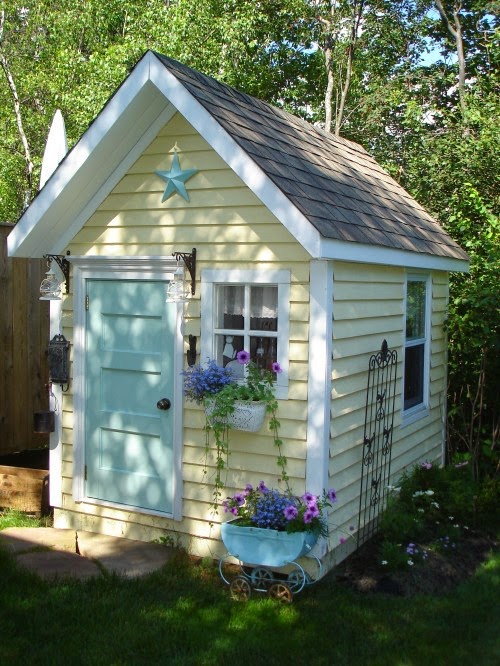 garden playhouse with flowers