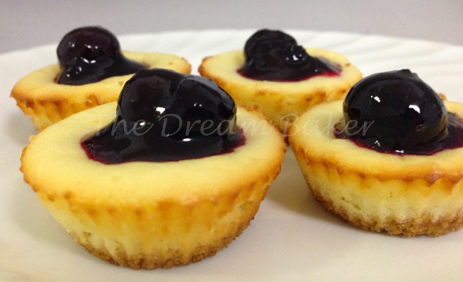 The Dream Baker... Mini Cheesecakes with Blueberry Compote