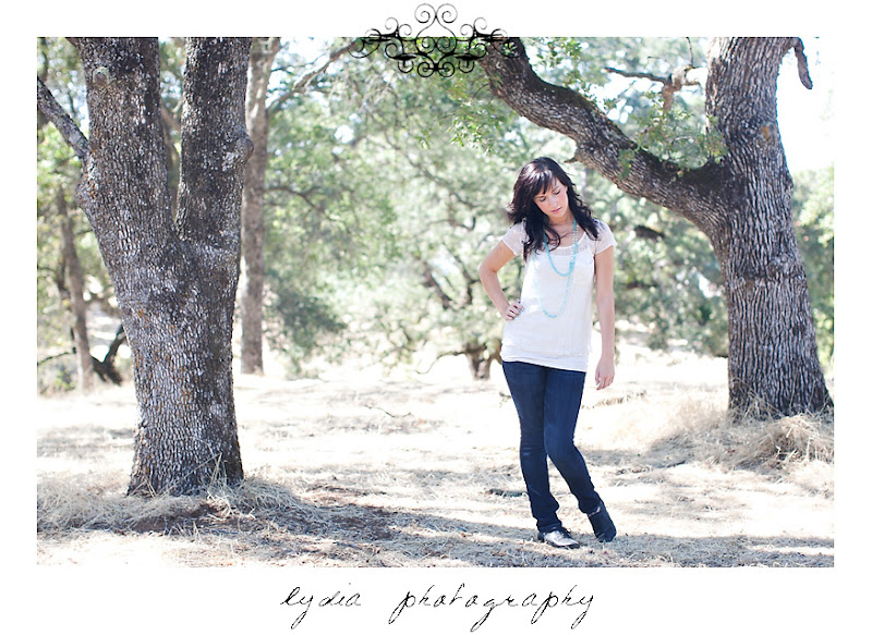 Senior girl posing in front of old oak trees at Forest Lake Christian senior lifestyle portraits in Rocklin, California