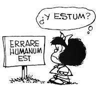 Mafalda leyendo un cartelito que dice errare humanum est