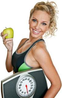 Fit Woman Holding a Scale and an Apple