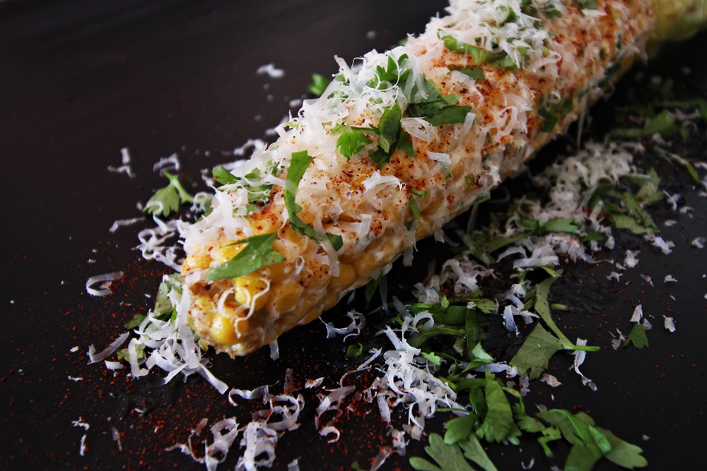 Delicious Tapas Mexican corn with cilantro, chipotle & Parmesan cheese
