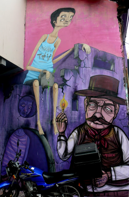 piguan graffiti street art in patronato, santiago de chile
