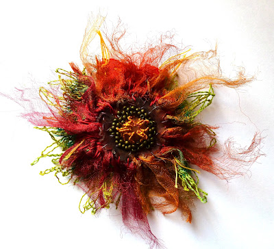 Textured poppy in stitch and shrink plastic by Alysn Midgelow-Marsden