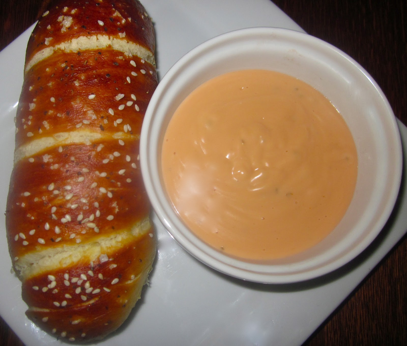 Haute + Heirloom Pretzel Wrapped Sausages with JalapenoBeerCheddar