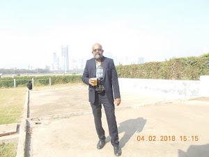 Seafarer/Blogger/Traveller Rudolph.A.Furtado in the "First Enclosure" with mug of Kingfisher beer.