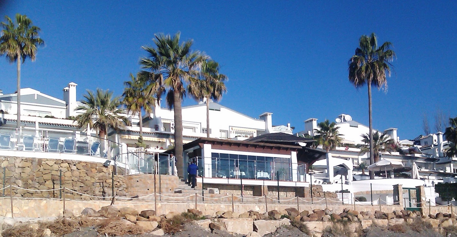 HomeCare Estepona View of Dominion Beach restaurant and beach pool