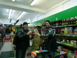 a group of men standing in a store