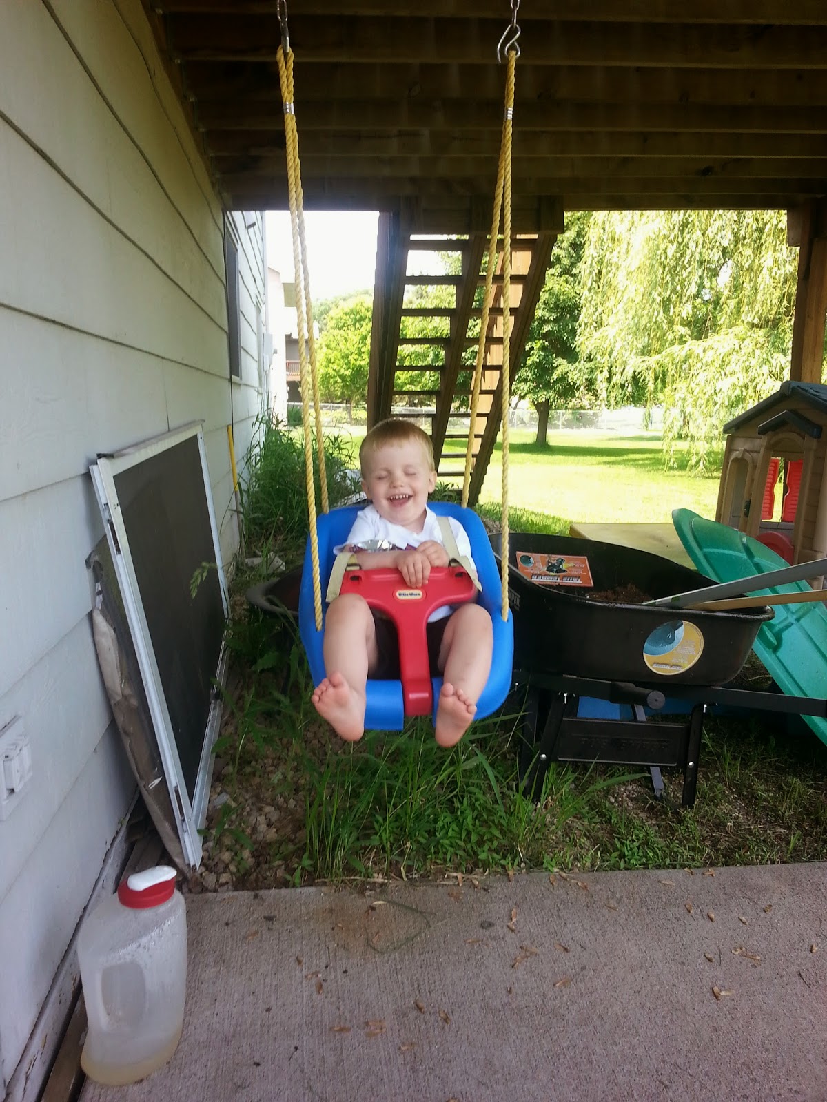 The Hotdish Mom Under Deck Landscaping and Fenced Kids Play Area