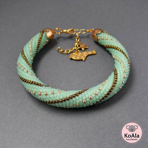 Turquoise and gold striped bead crochet bracelet by Koala Handmade Jewelry.