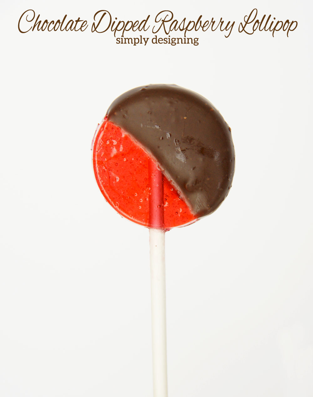 Chocolate Dipped Raspberry Lollipops | #candy #recipe #lollipop