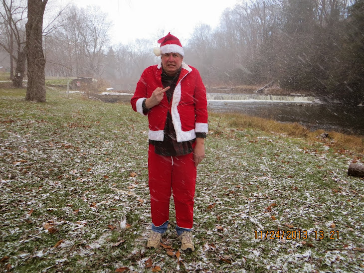 Santa's cute Helper,aka,Blog Cam Guy doesn't like the Brady Lake Village clerk gang !